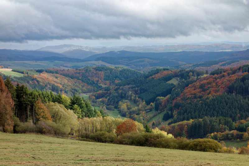 Autumn panorama with clouds and colorful forests, Titmaringhausen, Hochsauerland